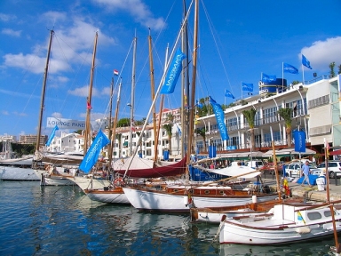 Façade of the building of the club maritime Mahon, and casino gambling, on the docks of the club, the boats are sailing classic involving racing Minorca Panerai